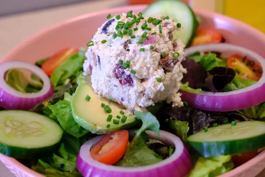 Chicken or tuna salad over greens with avocado, cucumber, tomato and red onion at 43rd Street Deli
